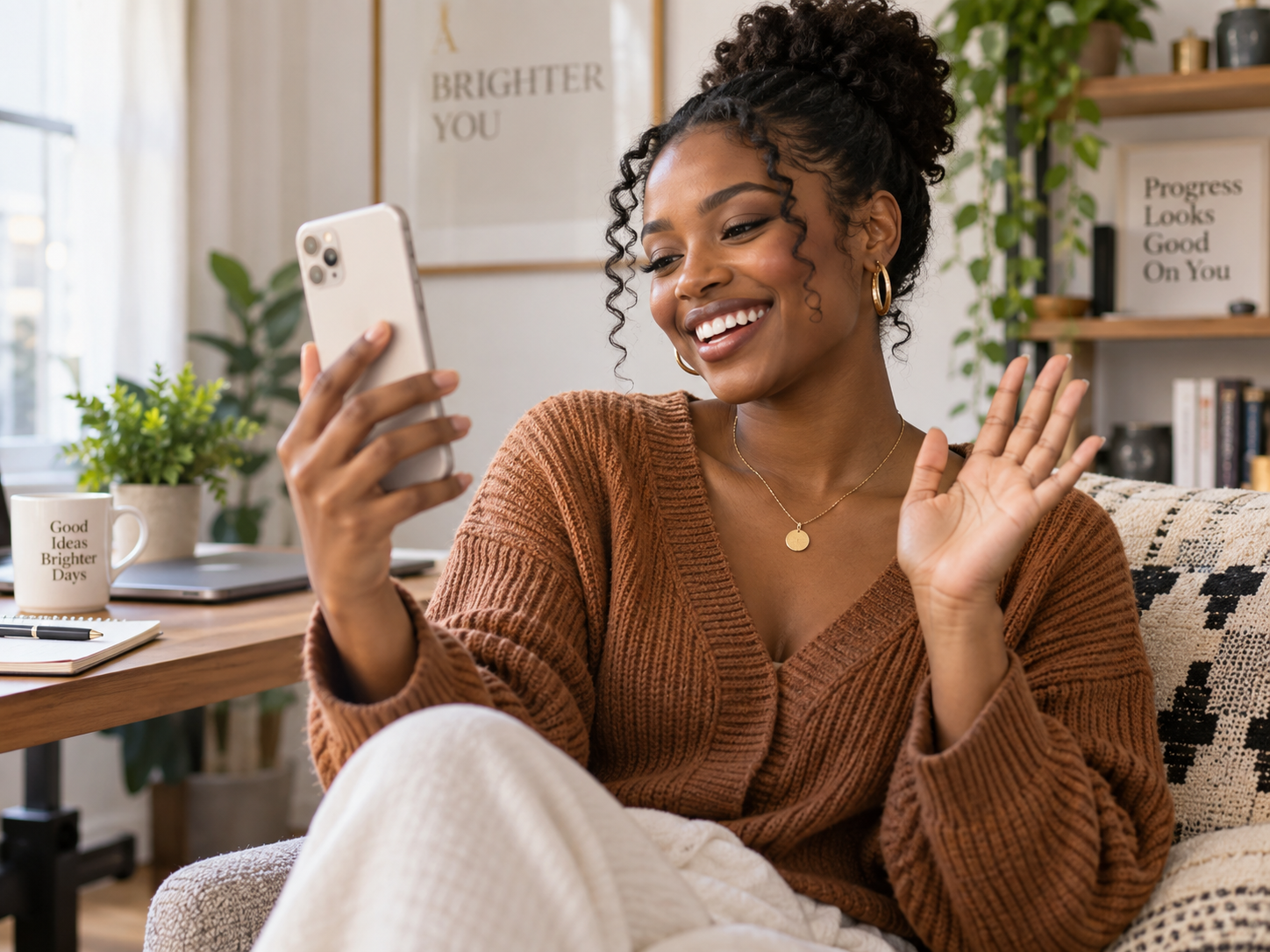 A woman smiling during a private online conversation with a human listener